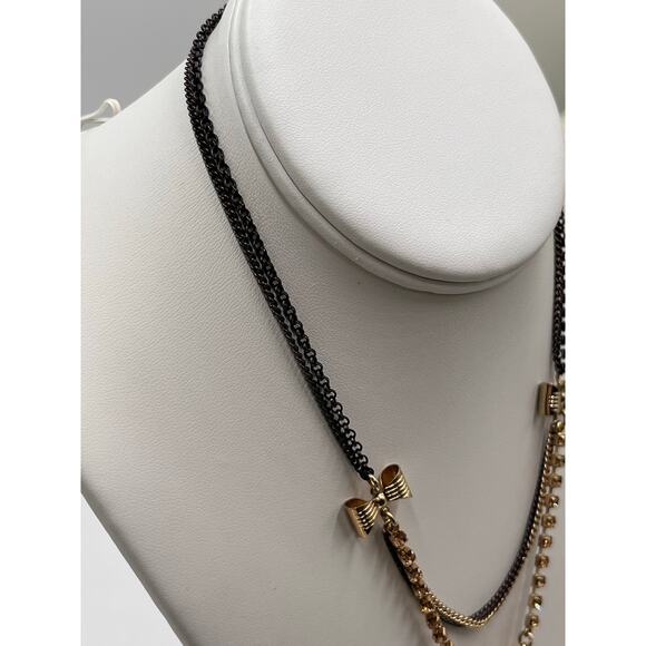 Betsey Johnson Hollywood
Glam Leopard Tiger Head Dangle Bow Gold Necklace - Picture 6 of 12